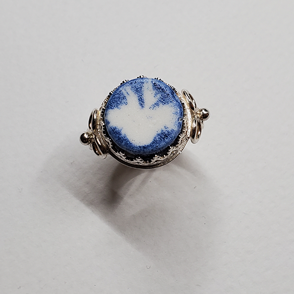 Sterling Sterling Silver Handmade Ring  with Round Porcelain Focal Cabochon, Blue transferware abstract stippled pattern. Fancy bezel and trillian design on sides. Size 8.75.  See listing for sizing details. 